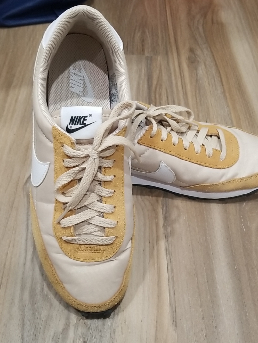 Nike womens Cream and Mustard Retro Low-Top Sneakers